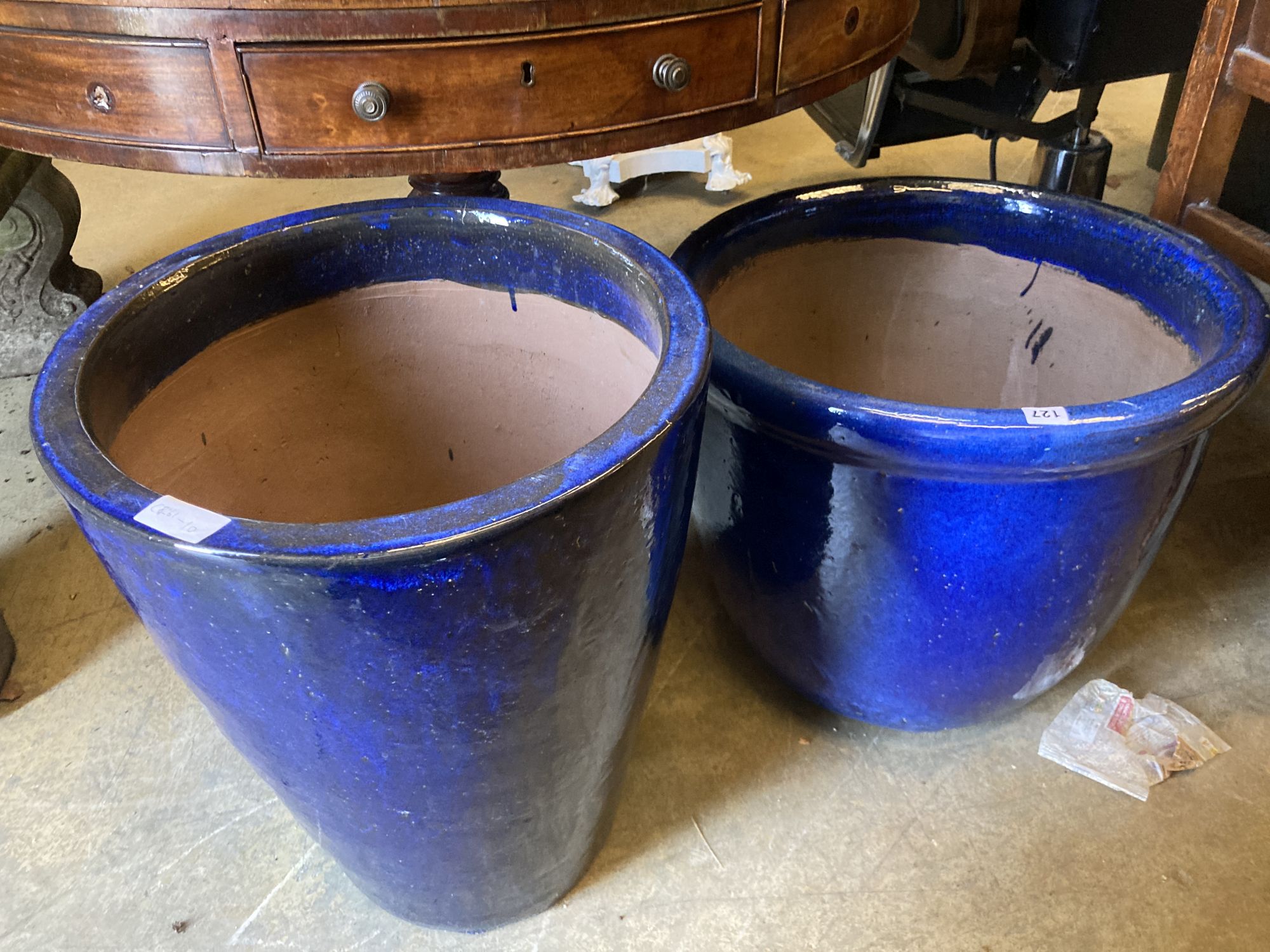 Two blue glazed circular garden planters, larger 54cm diameter, height 46cm